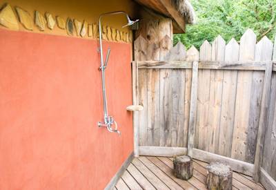 Escarpment Luxury Lodge large luxurious chalet twin double four-poster freestanding bath Tanzania