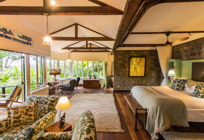 Gibb's Farm luxury bedroom twin queen fireplace en-suite veranda Tanzania
