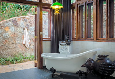Gibb's Farm freestanding bathtub indoor outdoor shower en-suite Tanzania