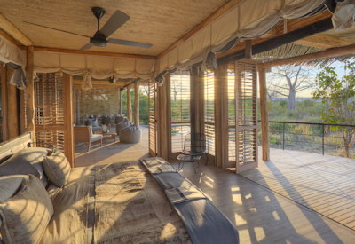 Jabali Private House bedroom wooden shutters Ruaha National Park views Tanzania