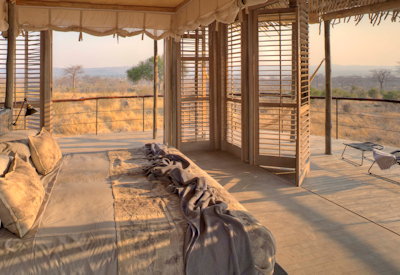 Jabali Ridge large open-fronted suite wooden shutters king twin beds WiFi Ruaha Tanzania