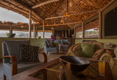 Karatu Simba Lodge thatched central lounge bar indoor dining Ngorongoro Tanzania