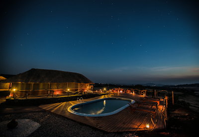 Karatu Simba Lodge swimming pool illuminated night Ngorongoro Tanzania