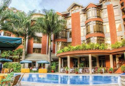 Kibo Palace Hotel tropical gardens swimming pool Marangu Arusha Tanzania
