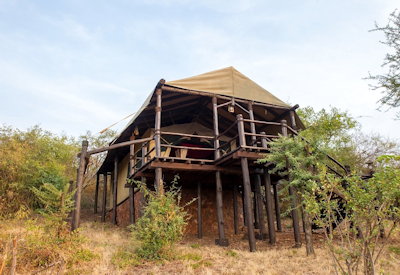 Kirawira Serena Camp tented suite raised wooden platform Serengeti views Tanzania