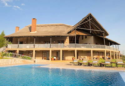 Kitela Lodge large double-storey colonial thatched lodge Ngorongoro highlands Tanzania