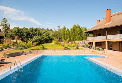Kitela Lodge large swimming pool views Ngorongoro highlands Karatu Tanzania