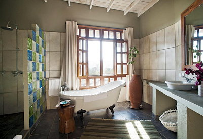 Kitela Lodge beautifully appointed bathroom en-suite bathrobe slippers Tanzania