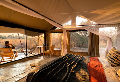 Kwihala Camp classic Meru canvas tented suite bucket shower flushing toilet veranda Tanzania