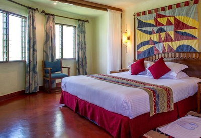 Lake Manyara Serena Lodge classic thatched stone chalet tribal dwelling design Tanzania