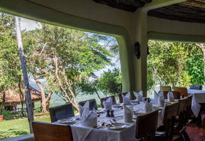 Lake Manyara Serena Lodge open-fronted dining terrace escarpment views Tanzania