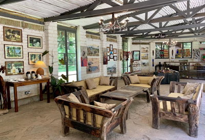 Mount Meru Game Lodge 1920s colonial lounge bar large windows mango terrace Tanzania