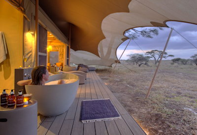 Namiri Plains Camp outdoor al fresco freestanding bath Serengeti views Tanzania