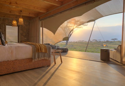 Namiri Plains Camp bedroom Serengeti plains views indoor outdoor shower Tanzania