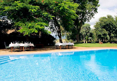 Ngorongoro Farm House swimming pool coffee plantation views Karatu Tanzania