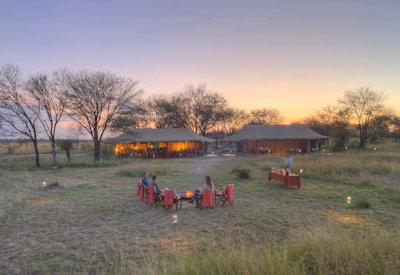Olakira Migration Camp stargazing tent open roof panel African stars Serengeti Tanzania