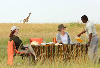 Olakira Migration Camp dining under canvas Serengeti plains three-course Tanzania