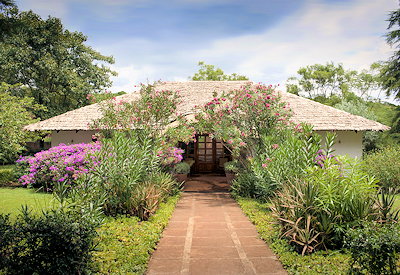 Plantation Lodge green tropical oasis 1890 German colonial farmhouse restored Tanzania