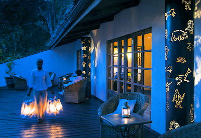 Plantation Lodge four-course dinner setup evening candlelit Tanzania