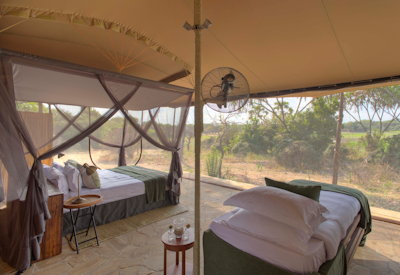 Roho ya Selous family suite interleading en-suite bedrooms Selous Tanzania