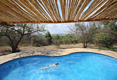 Roho ya Selous swimming pool Lake Nzerakera views Selous Game Reserve Tanzania