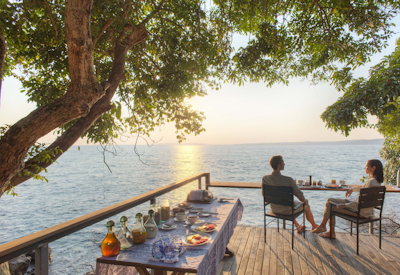 Rubondo Island Camp spectacular Lake Victoria sunset beach fire pit Tanzania Asilia