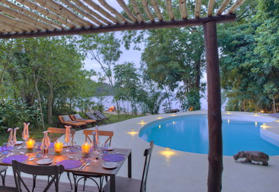 Rubondo Island Camp swimming pool sun loungers viewing deck Lake Victoria Tanzania