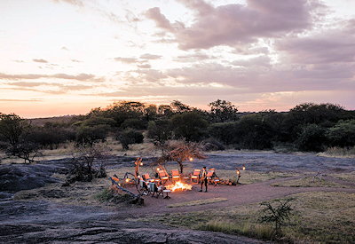 Sanctuary Kusini Camp campfire drinks stargazing African night sky southern Serengeti Tanzania