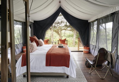Sanctuary Ngorongoro Crater Camp large luxurious suite king bed en-suite Tanzania