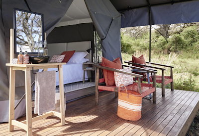 Sanctuary Ngorongoro Crater Camp private wooden deck coffee Ngorongoro wildlife Tanzania