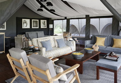Sanctuary Ngorongoro Crater Camp lounge bar small library Ngorongoro Conservation Tanzania