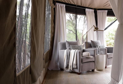 Sanctuary Swala Camp private lounge library infinity pool waterhole Tarangire Tanzania