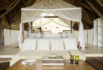 Sand Rivers Selous luxurious open-fronted room Rufiji River panoramic views Tanzania