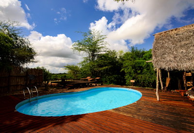 Selous Impala Camp swimming pool sun loungers Rufiji River Selous Tanzania