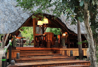 Selous Serena Camp thatched central guest area lounge library views Selous Tanzania