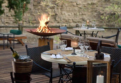Selous Serena Camp dining area firepit outdoor dining Selous Game Reserve Tanzania