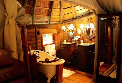 Selous Serena Camp en-suite Victorian claw-foot bath outdoor shower Tanzania