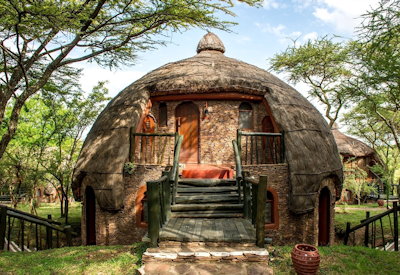 Serengeti Serena Safari Lodge thatched beehive cottages Serengeti ecosystem Tanzania