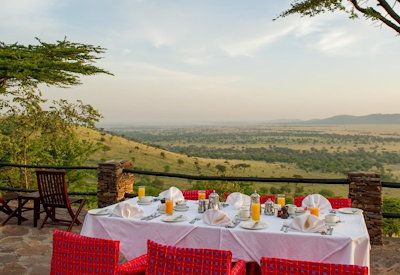 Serengeti Serena Safari Lodge dinner table d'hôte Serengeti plains views Tanzania