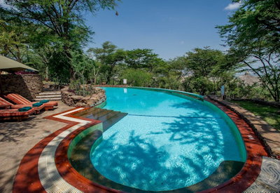 Serengeti Serena Safari Lodge infinity pool Serengeti plains water garden Tanzania