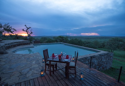 Serengeti Simba Lodge classic lounge fireplace bar outdoor viewing deck Tanzania