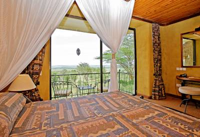 Serengeti Sopa Lodge classic bedroom air conditioning minibar verandah Tanzania