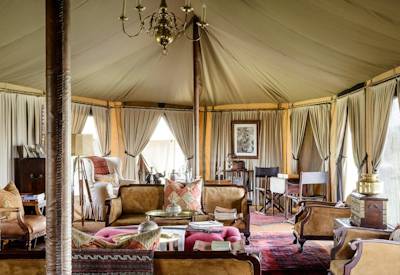 Singita Sabora Tented Camp lounge library satellite TV Grumeti Reserve Tanzania