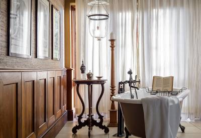 Singita Sasakwa Lodge en-suite bath shower dressing area guest bathroom Grumeti Tanzania