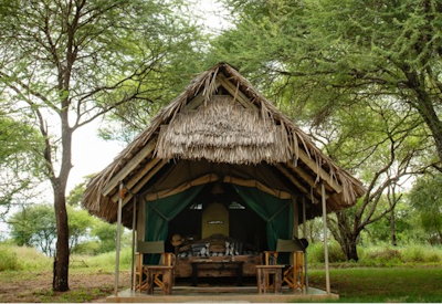 Tarangire Safari Lodge thatched canvas suite solar shower round Maasai hut bungalow Tanzania