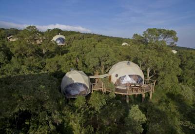 The Highlands Ngorongoro unique domed canvas glass lodge Asilia Conservation Area Tanzania