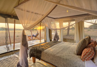 Ubuntu Migration Camp private intimate tented suite bucket shower flushing toilet Tanzania