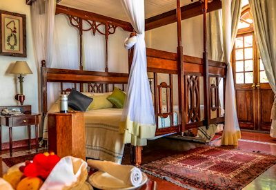 Zanzibar Serena Hotel Swahili sultan-styled room high ceilings white walls Zanzibar
