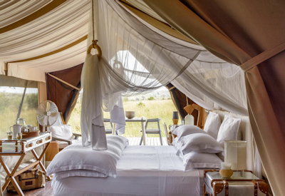 Mara River crossing wildebeest crocodile Grumeti Singita Fly In Express Tanzania