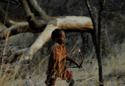 Hadzabe women gathering berries tubers baobab fruit Yaeda Valley Tanzania